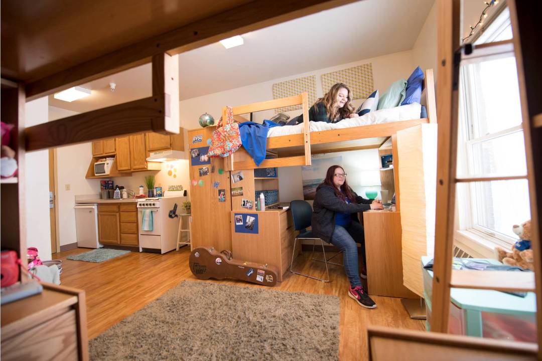 Image of students in a 1 bedroom apartment style room